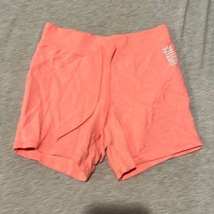 The shorts are peachy colored perfect for summer